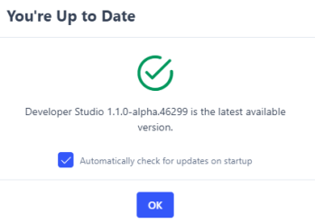 The You're Up to Date dialog box shows a green checkmark and the latest available version